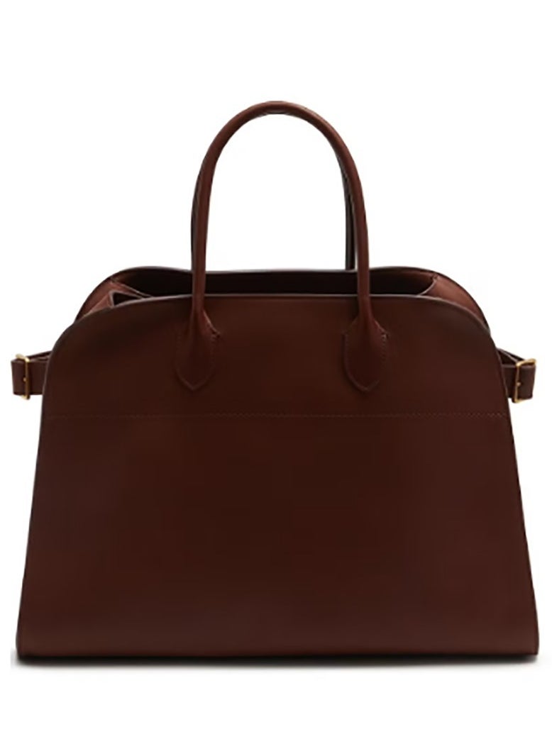 The tote bag named Margaux 15, made from smooth leather, is from The Row.