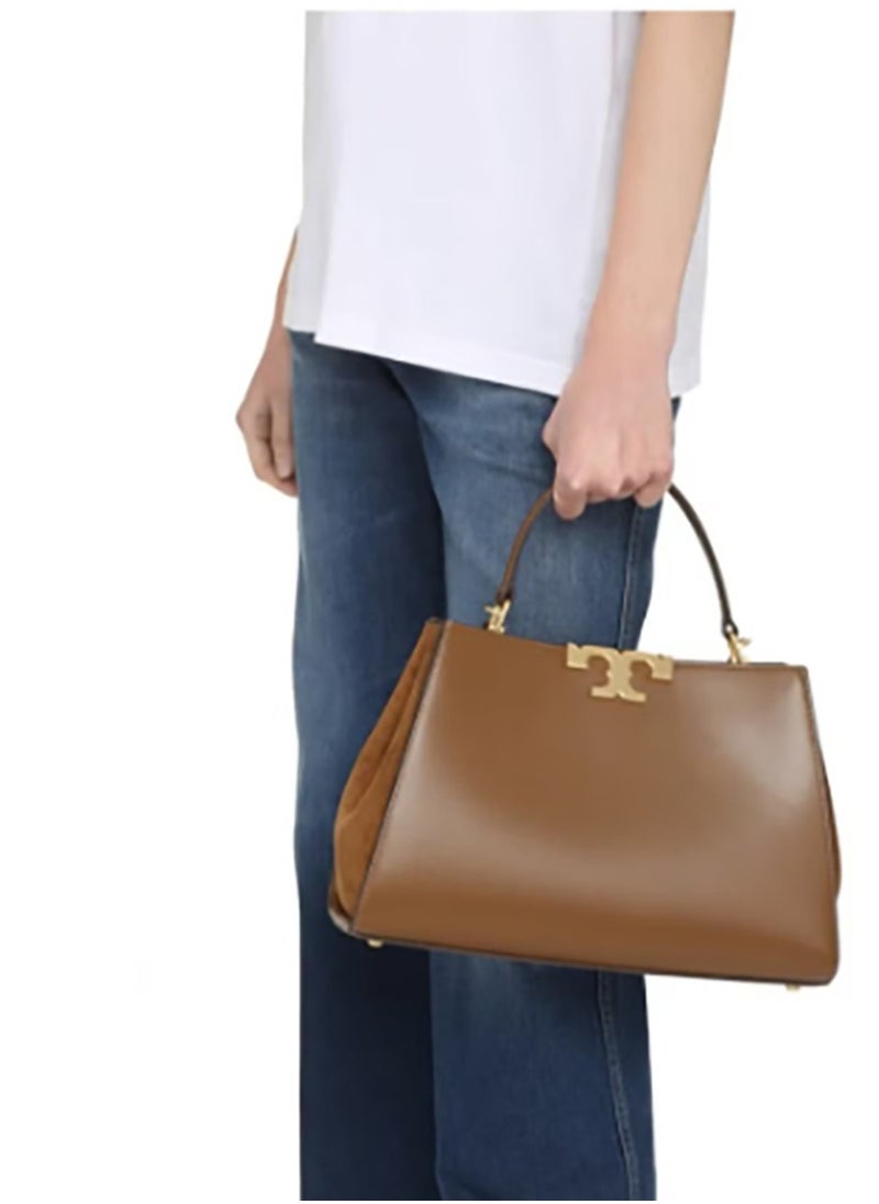 The shoulder crossbody tote bag by Tory Burch, crafted from leather and trimmed with suede, named Eleanor.