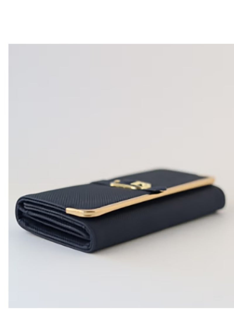A recently released large purse with a snap - around design
