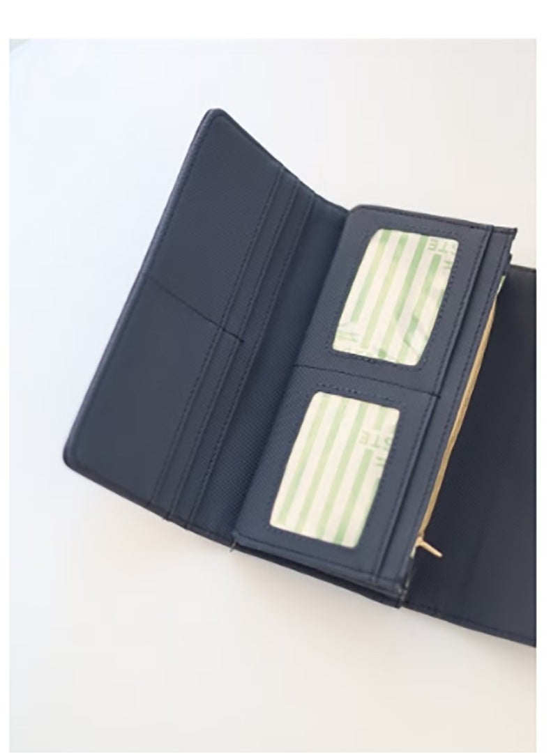 A recently released large purse with a snap - around design