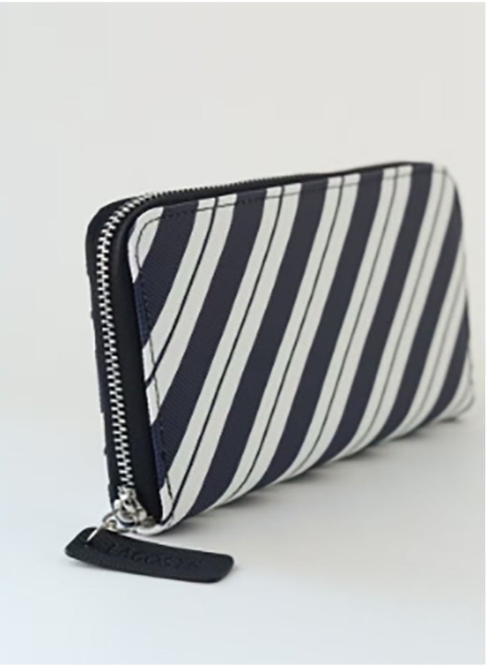 A spacious purse featuring a zip - around design