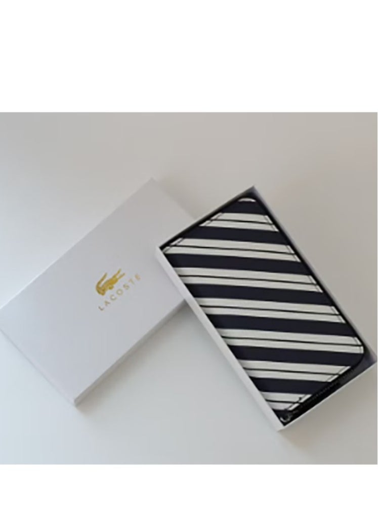 A spacious purse featuring a zip - around design