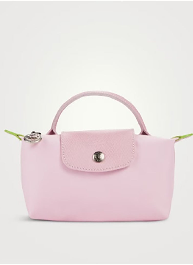 Longchamp's Le Pliage series features this Mini Sport Dumpling Bag designed especially for women