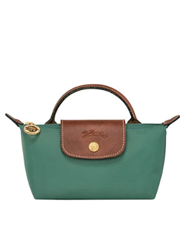 Longchamp's Le Pliage series features this Mini Sport Dumpling Bag designed especially for women