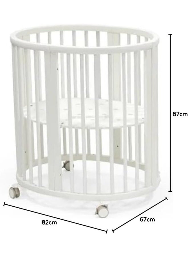 Sleepi Mini Oval Baby Crib 0-6 Months Height-Adjustable Base, Lockable Swivel Wheels Natural