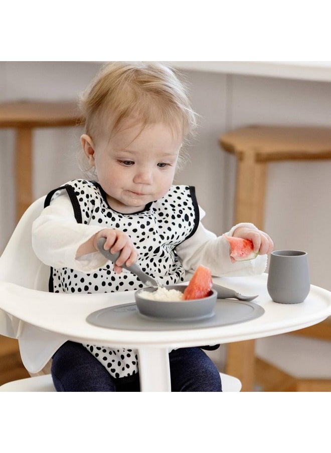 ezpz First Food Set - 100% Food Grade Silicone Suction Bowl with Built-in Placemat, Training Cup & Spoon - Designed by a Pediatric Feeding Specialist - Promotes Self Feeding - 6 Months+ (Grey)