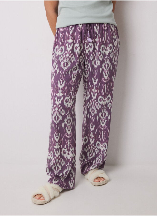 Long viscose trousers with ikat print
