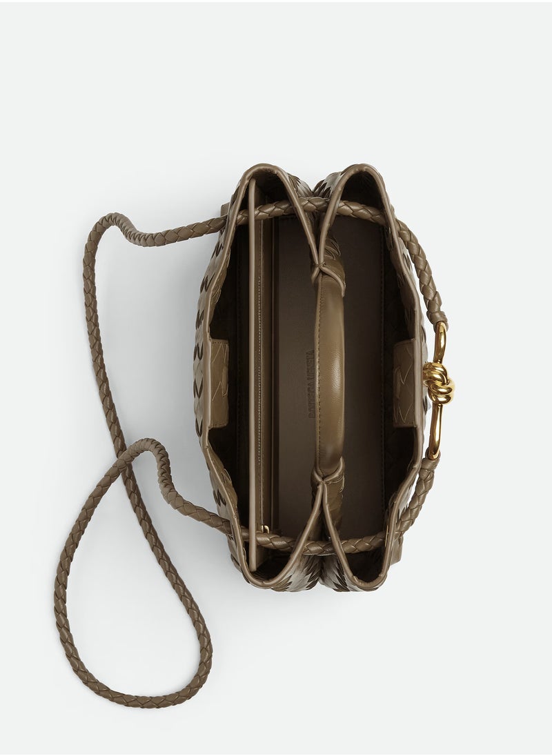 VENETA Andiamo Top handle bag leather bag with signature knot detail and sliding cross-body strap.