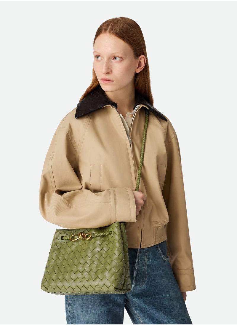 VENETA Andiamo Top handle bag leather bag with signature knot detail and sliding cross-body strap.