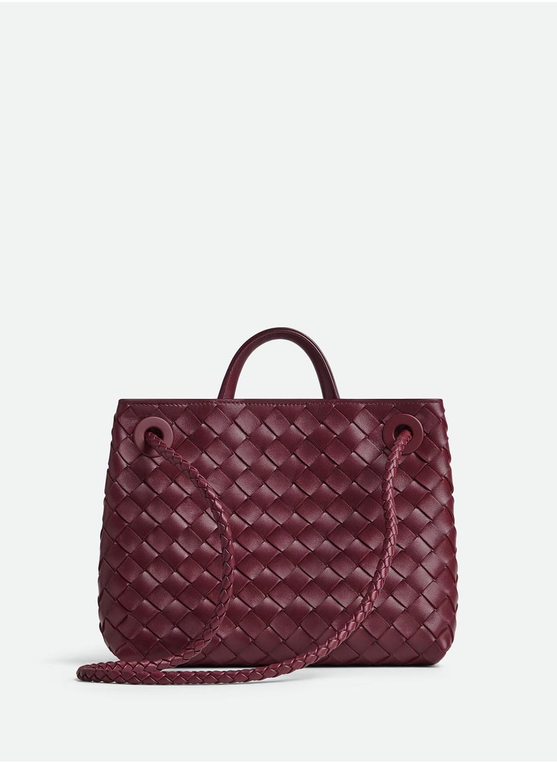 VENETA Andiamo Top handle bag leather bag with signature knot detail and sliding cross-body strap.