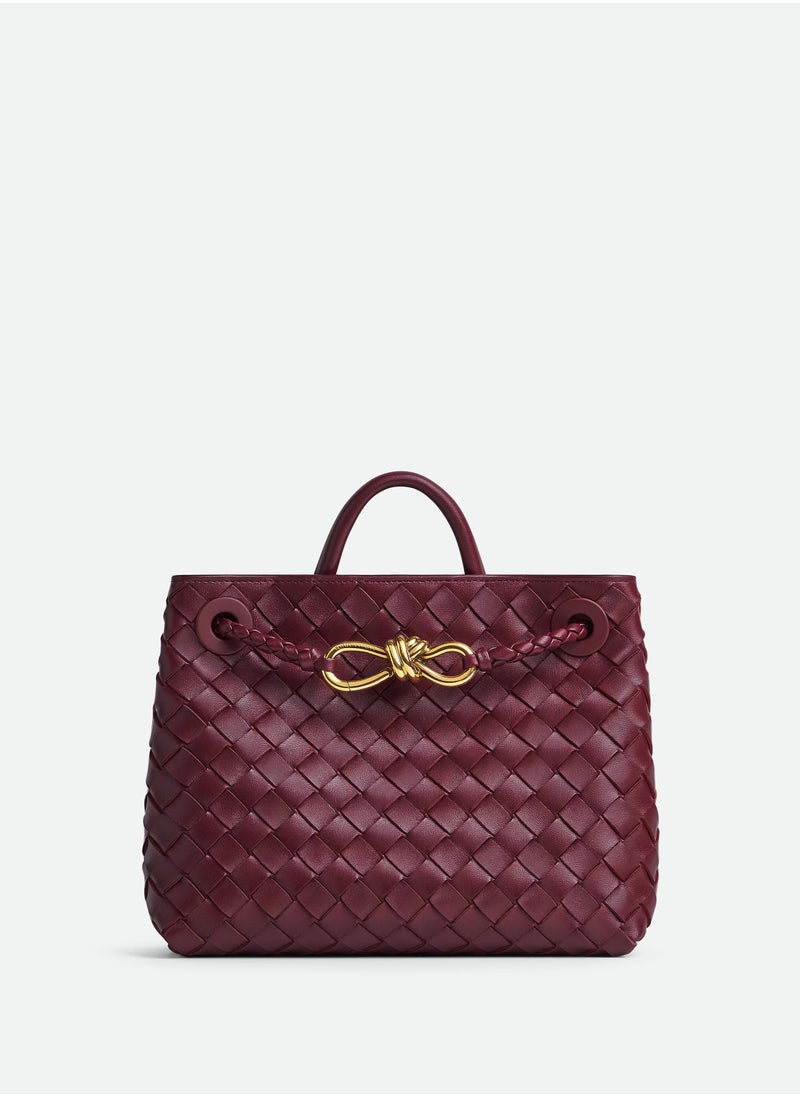 VENETA Andiamo Top handle bag leather bag with signature knot detail and sliding cross-body strap.