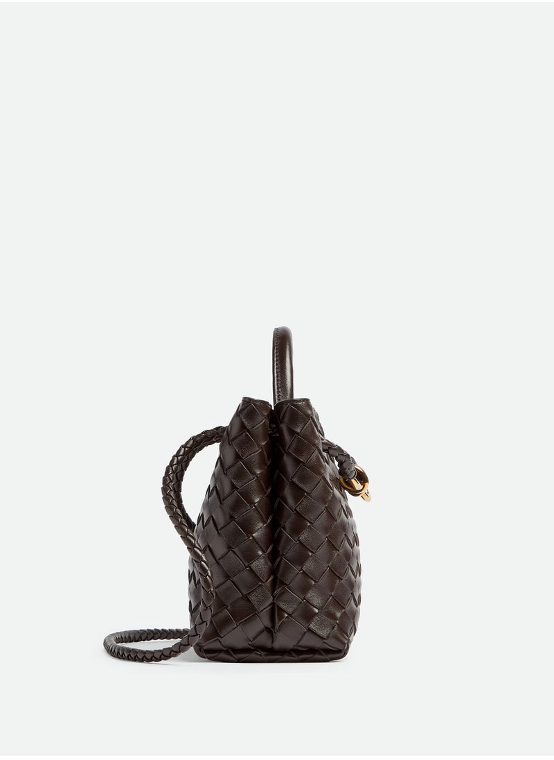 VENETA Andiamo Top handle bag leather bag with signature knot detail and sliding cross-body strap.
