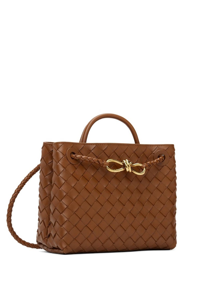 VENETA Andiamo Top handle bag leather bag with signature knot detail and sliding cross-body strap.