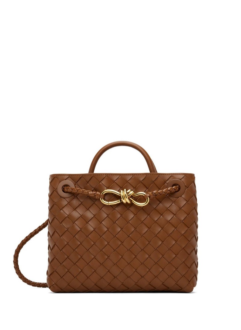 VENETA Andiamo Top handle bag leather bag with signature knot detail and sliding cross-body strap.