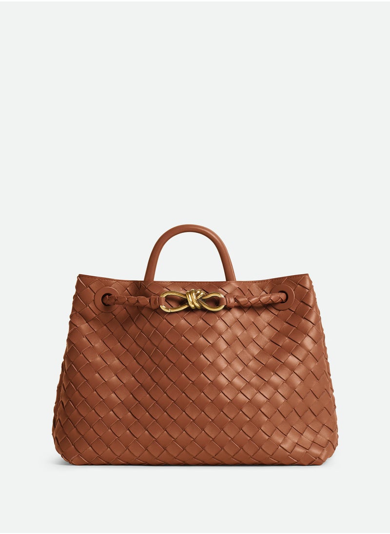 VENETA Andiamo Top handle bag leather bag with signature knot detail and sliding cross-body strap.