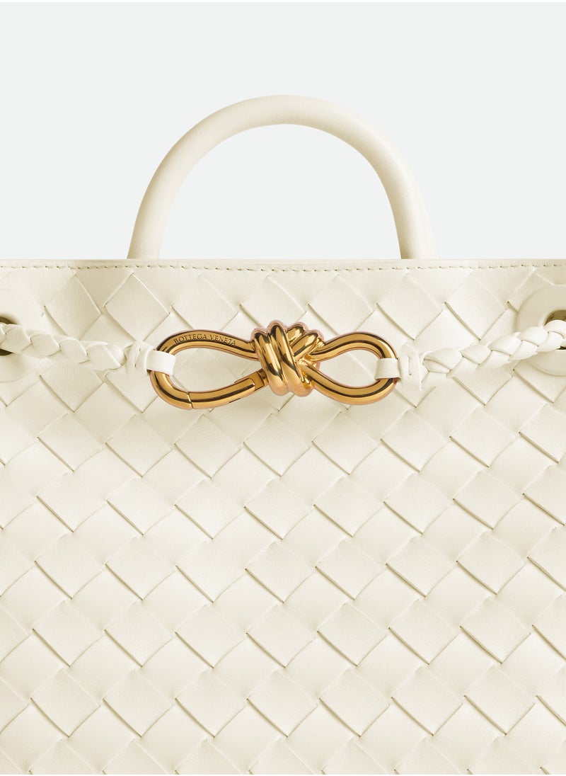 VENETA Andiamo Top handle bag leather bag with signature knot detail and sliding cross-body strap.