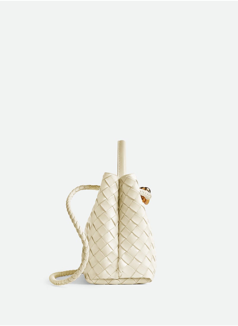 VENETA Andiamo Top handle bag leather bag with signature knot detail and sliding cross-body strap.