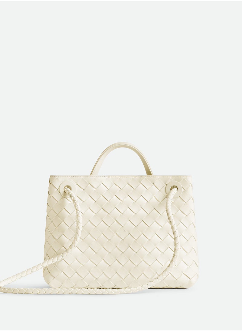 VENETA Andiamo Top handle bag leather bag with signature knot detail and sliding cross-body strap.
