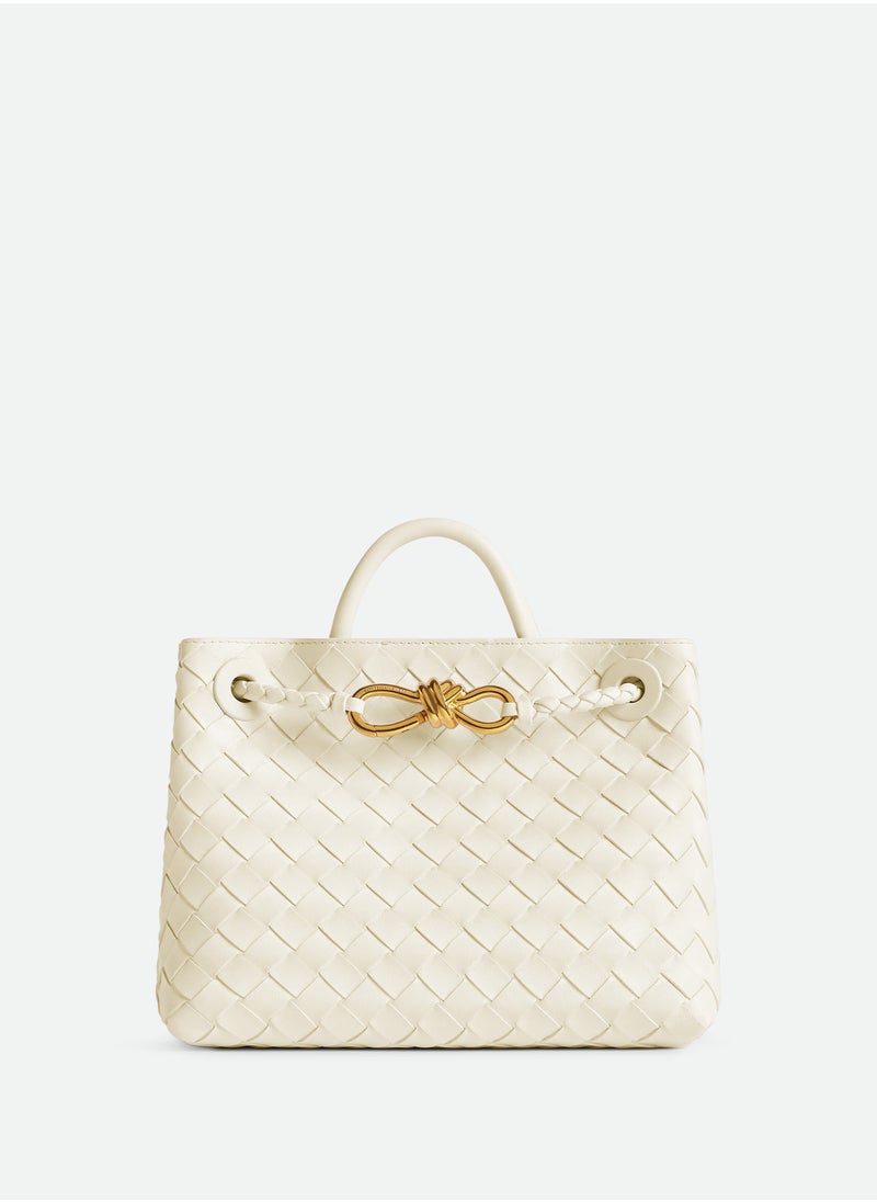 VENETA Andiamo Top handle bag leather bag with signature knot detail and sliding cross-body strap.