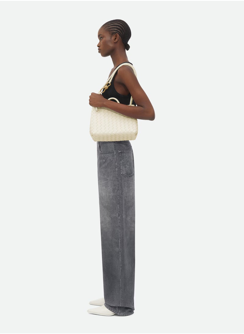 VENETA Andiamo Top handle bag leather bag with signature knot detail and sliding cross-body strap.