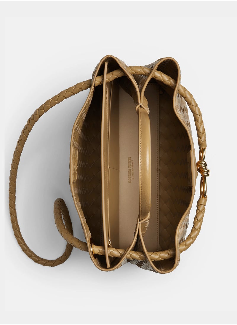 VENETA Andiamo Top handle bag leather bag with signature knot detail and sliding cross-body strap.