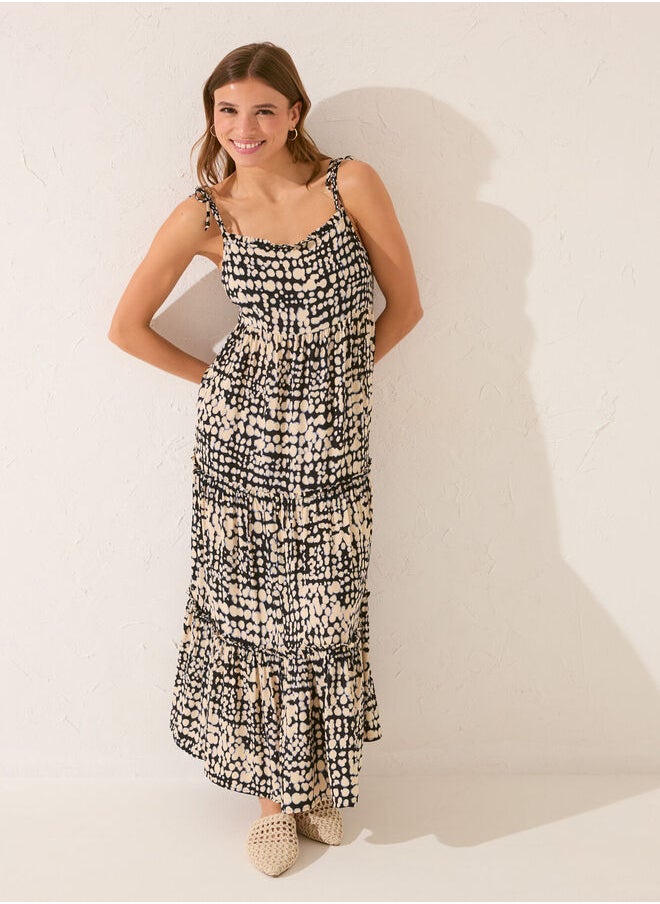 Long black dress with ruffles