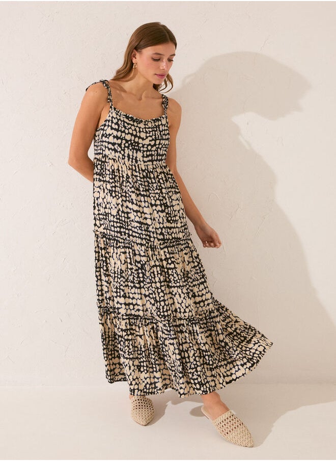 Long black dress with ruffles