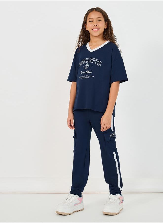 Styli Graphic Print V-Neck T-Shirt and Tape Detail Cargo Joggers Co-Ords
