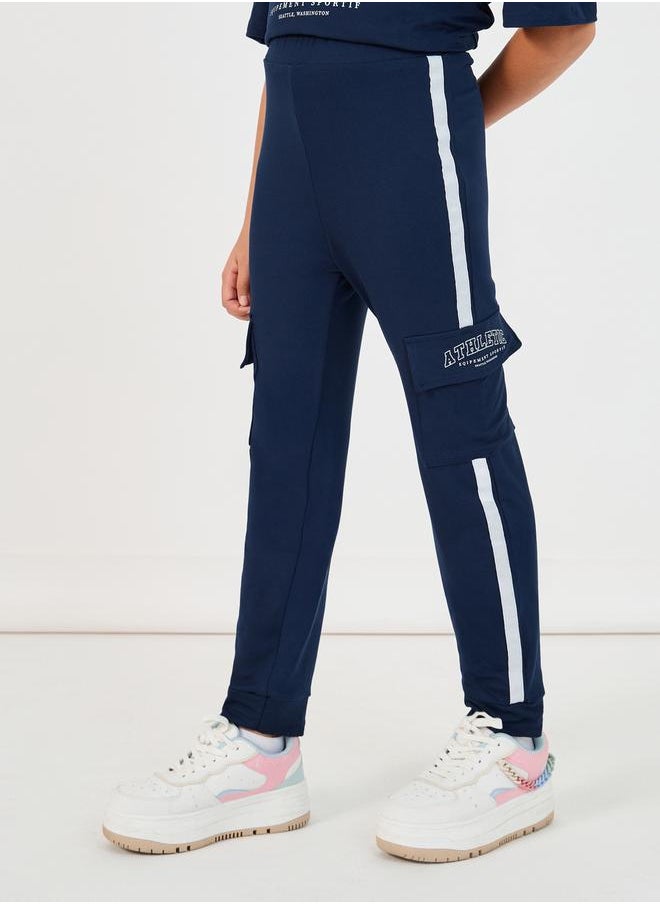 Styli Graphic Print V-Neck T-Shirt and Tape Detail Cargo Joggers Co-Ords