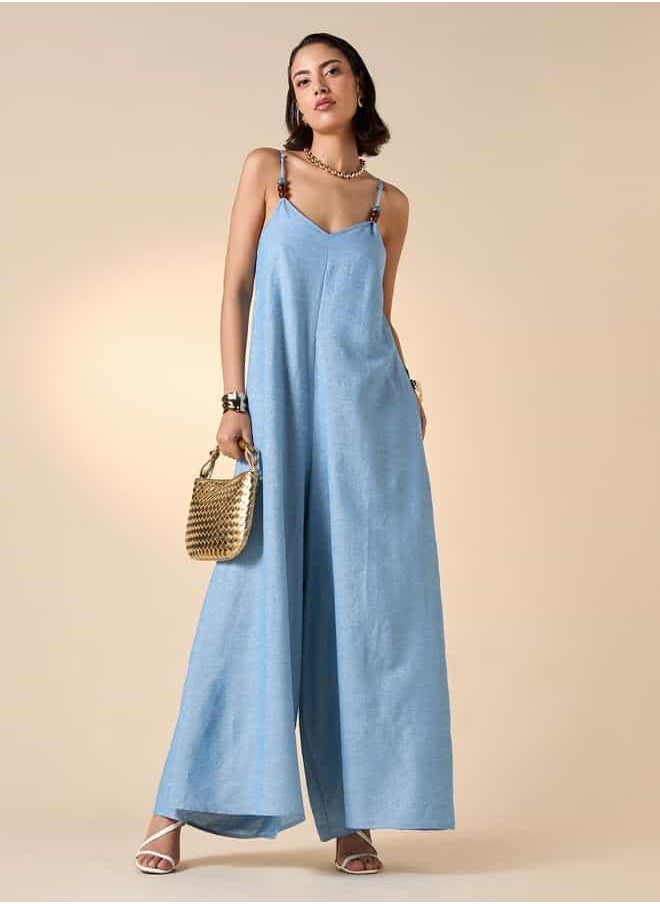 Iconic Sleeveless Jumpsuit with Bead and Tie-Up Detail