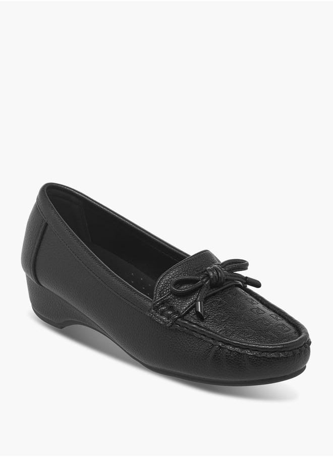 Women's Embossed Monogram Slip-On Loafers