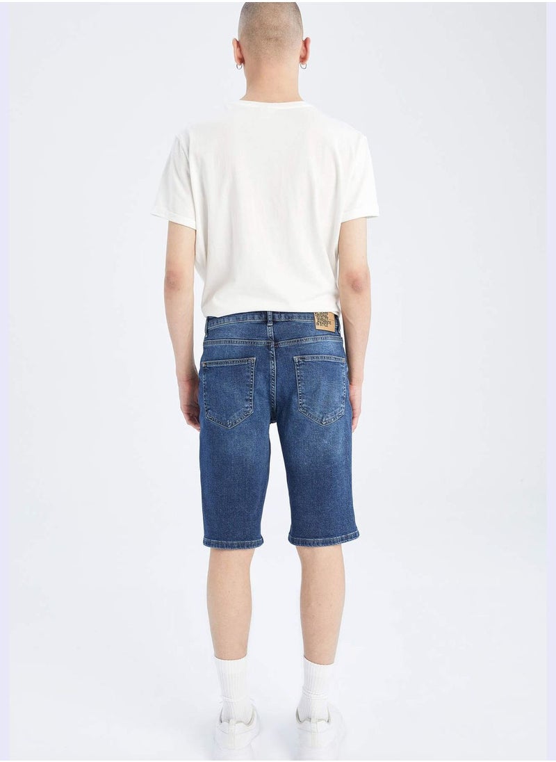 Slim Fit Distressed Jean Short
