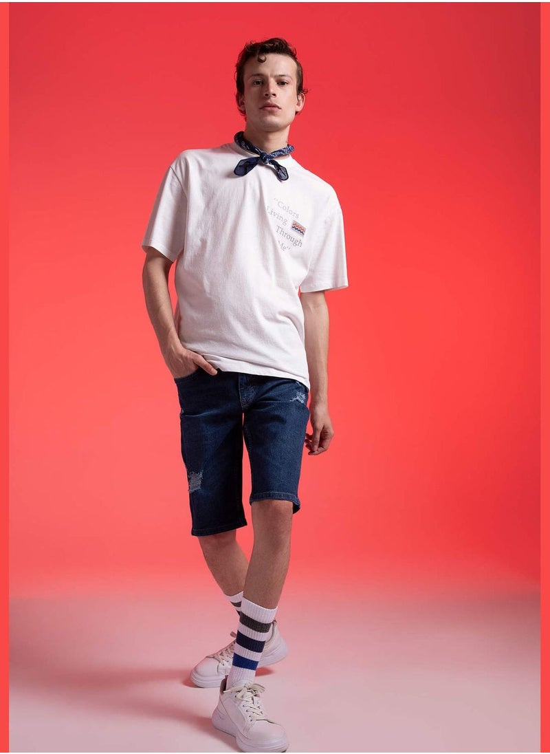 Slim Fit Distressed Jean Short