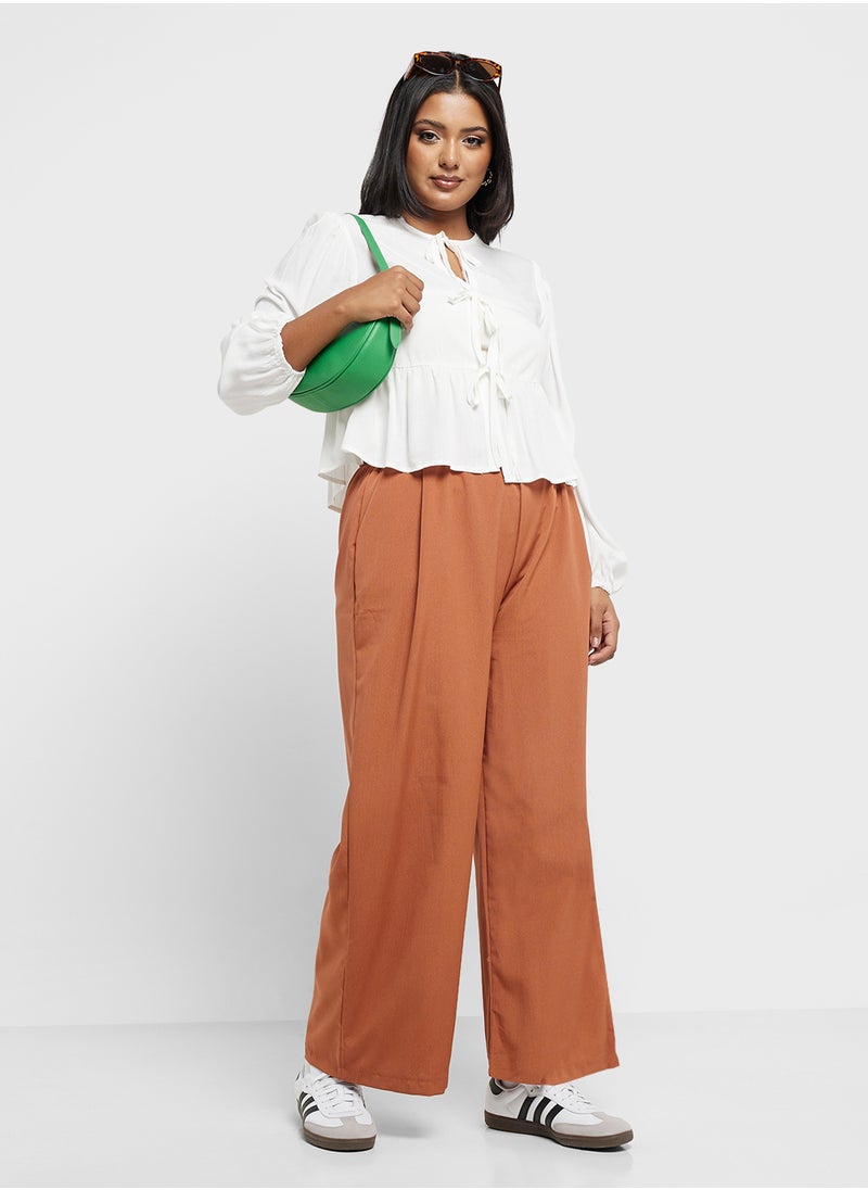 Bow Tie Up Peplum Blouse
