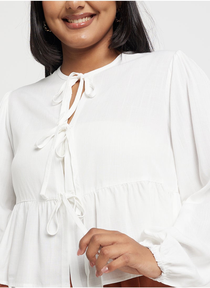 Bow Tie Up Peplum Blouse