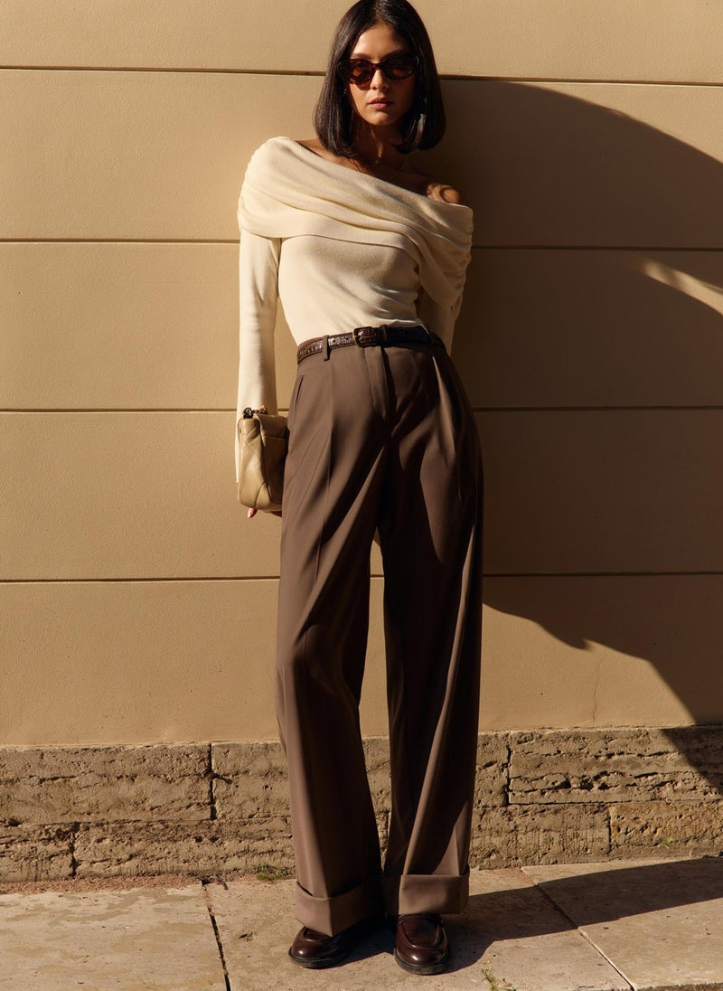 Suiting trousers with waist pleats and lapels