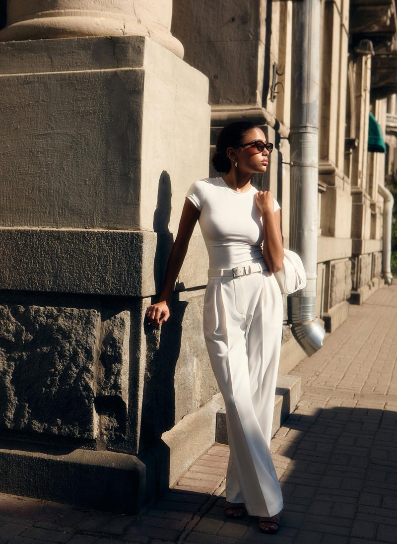 Trousers with a wide eco-leather belt