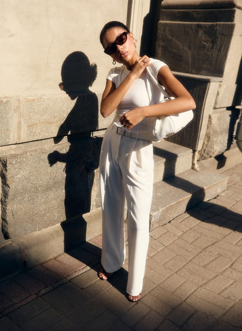 Trousers with a wide eco-leather belt