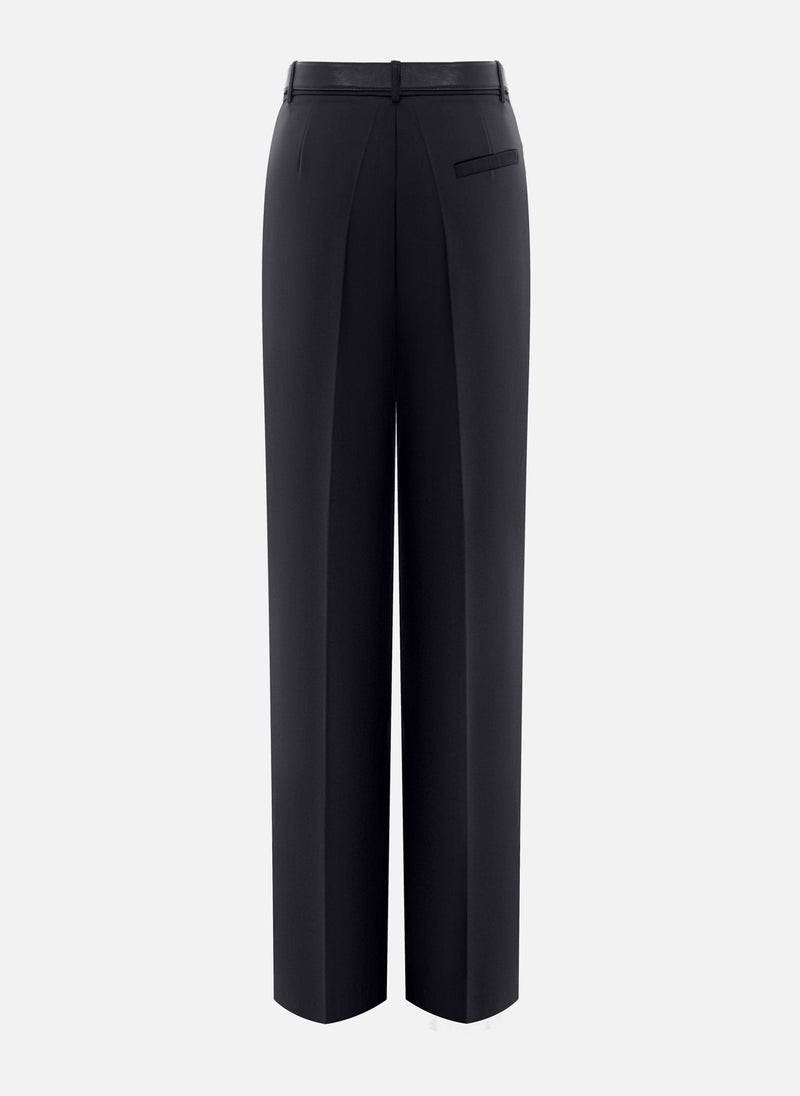 Loose suiting trousers with a belt