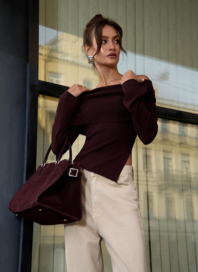 Knitted jumper with open shoulder line