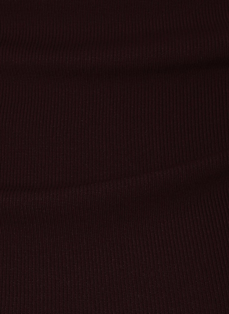 Knitted jumper with open shoulder line