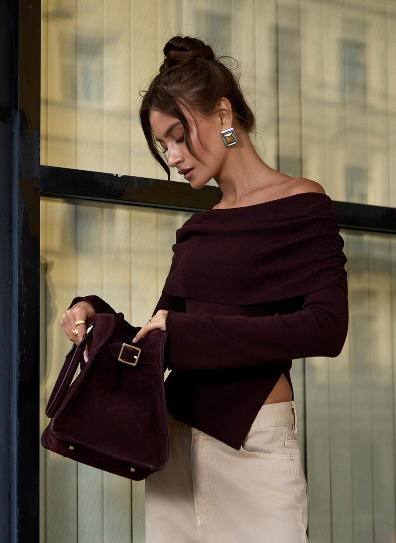 Knitted jumper with open shoulder line