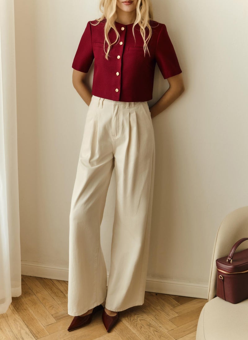 Short-sleeved tweed jacket with textured buttons