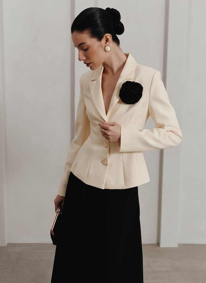 Fitted blazer with satin brooch