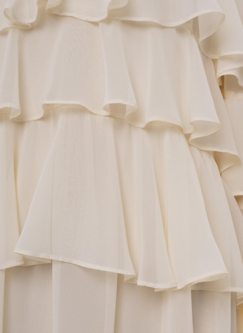 Airy maxi dress with ruffles on the bodice and matching ties