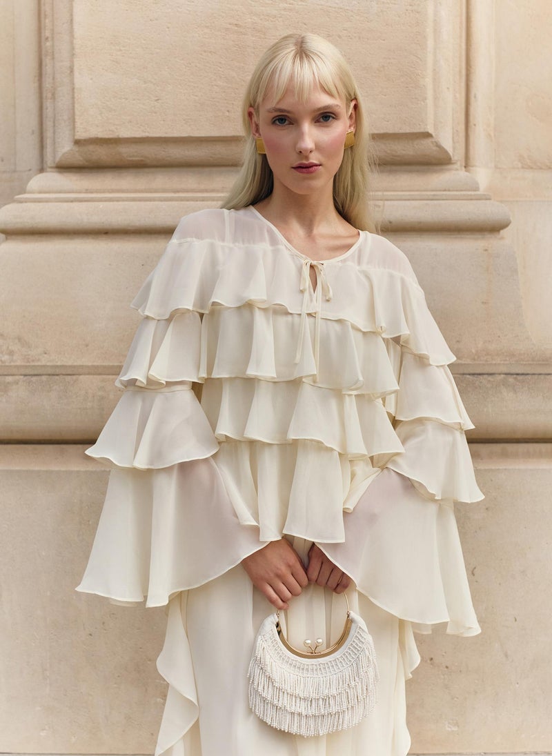 Airy maxi dress with ruffles on the bodice and matching ties