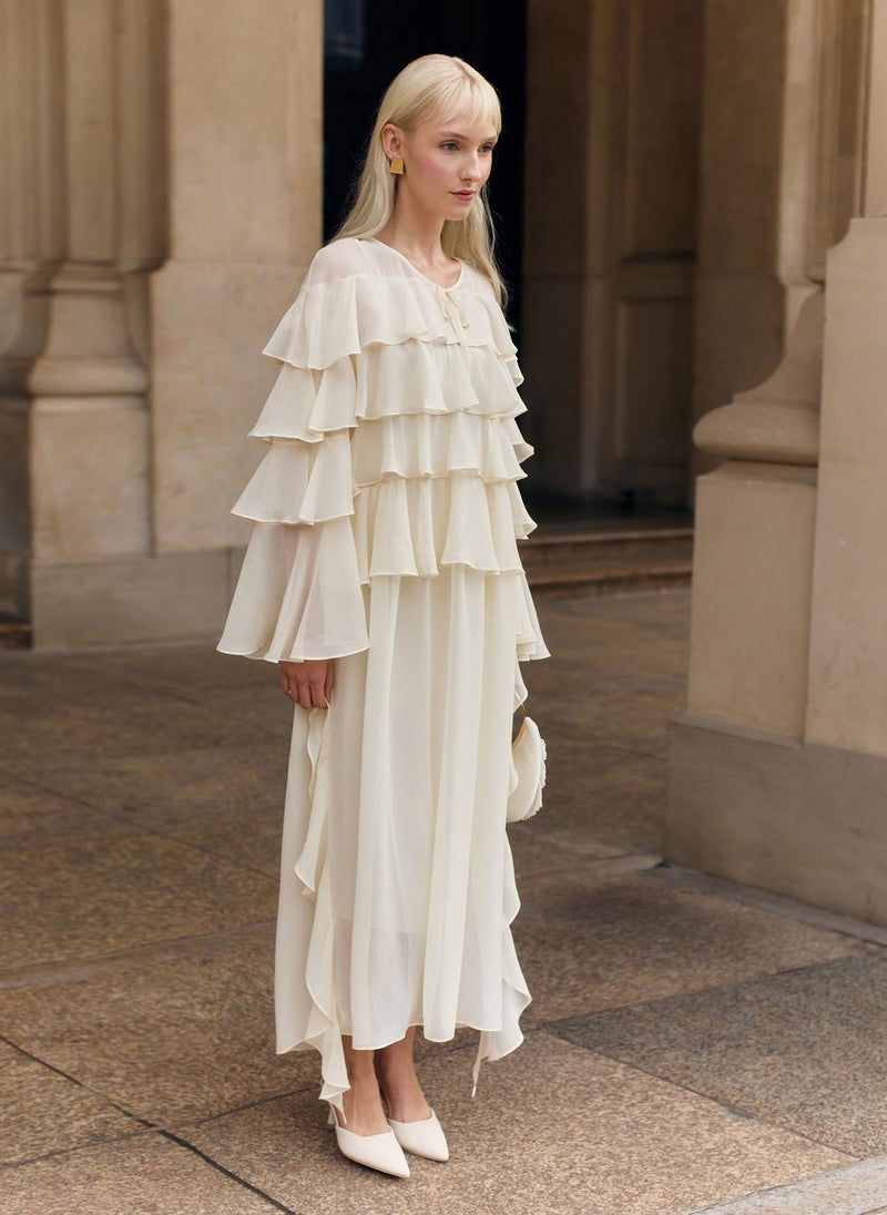 Airy maxi dress with ruffles on the bodice and matching ties