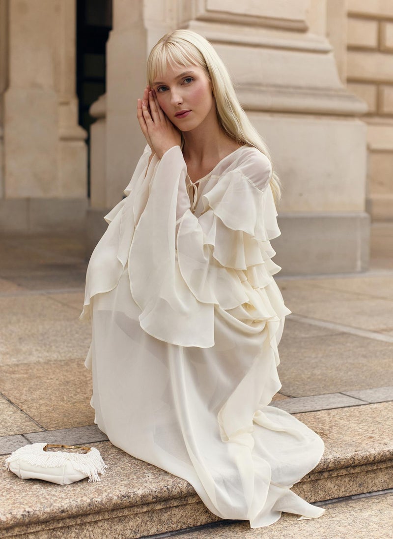 Airy maxi dress with ruffles on the bodice and matching ties