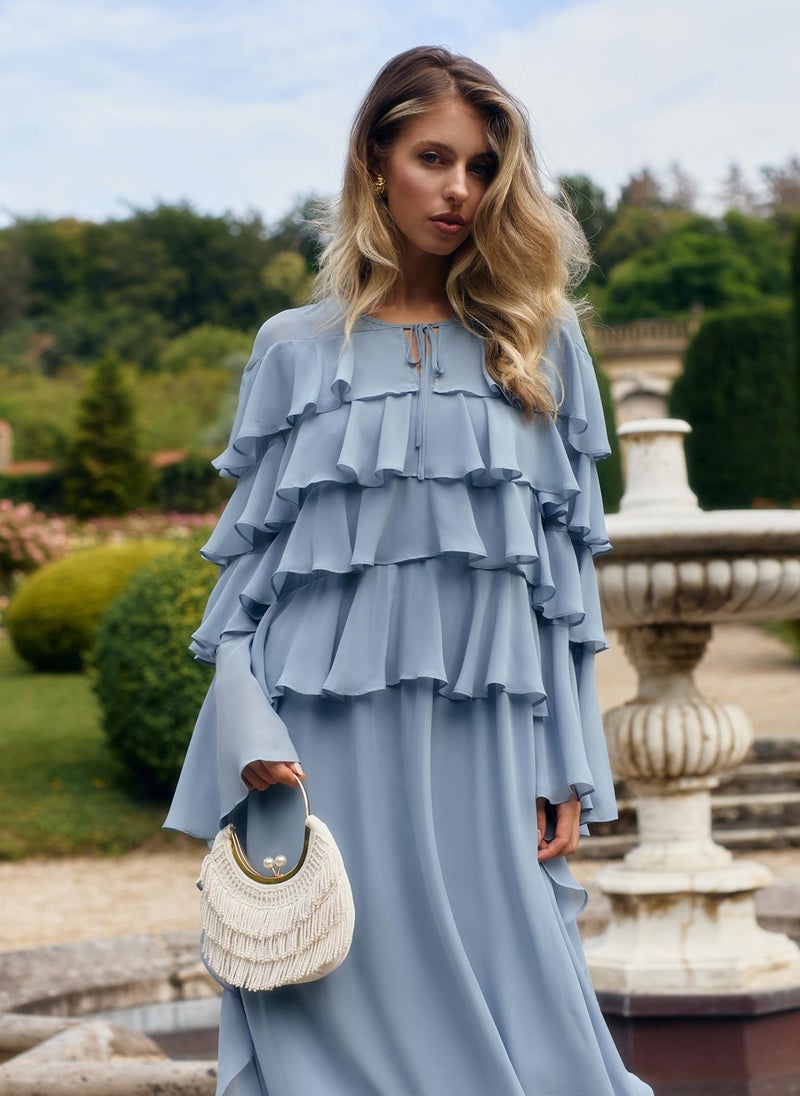 Airy maxi dress with ruffles on the bodice and matching ties
