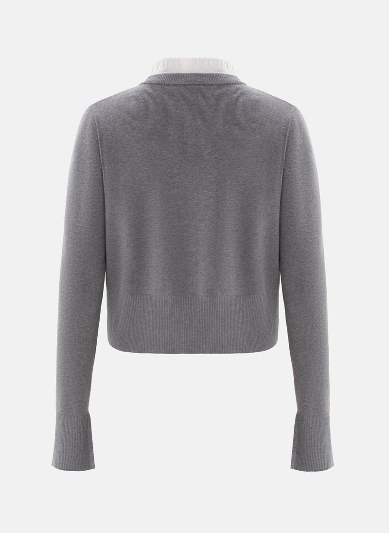 Cardigan with pleated insert on the collar